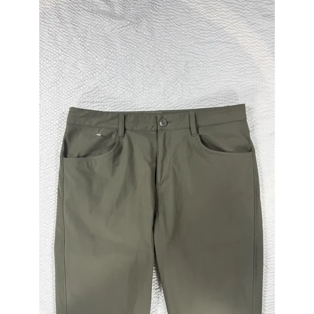 Vuori Pants Mens 32x27 Green Meta Stretch Performance Athletic Travel Golf